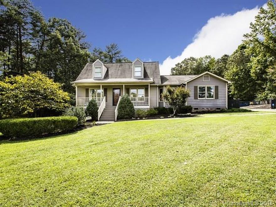 Warm & inviting home on peaceful .75 acre and no HOA! Spacious floor plan w/ master & additional bed/bonus on main. Fireplace w/ custom built surround & gas logs featured in family room. Kitchen is bright, roomy and the heart of the home. Relax on the wide front porch or the 2-teir deck w/ pool. Large, private lot with plenty of room to spread out and relax. Move-in ready and won't last long! Come discover it today!