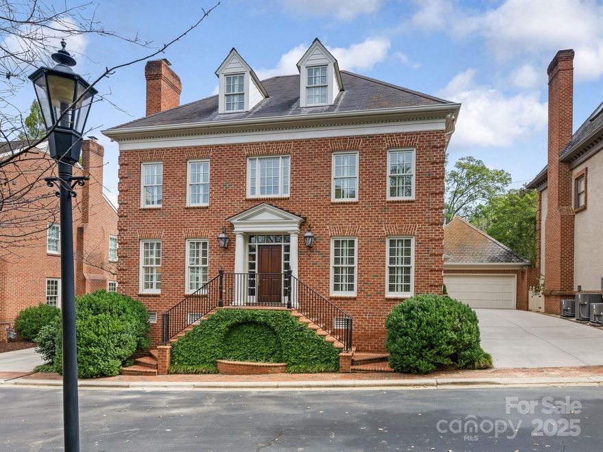 Whitehall the only private complex in Myers Park complete with a Guard House. Well designed with tons of green space and easy parking. Stunning marble foyer flanked by Dining Room and Living Room with Fireplace. Living Room opens to spacious Great room with fireplace and a wall of French Doors leading to a large private brick patio. wraparound windows in the breakfast area. The light in this house is truly amazing! Spectacular newly renovated kitchen. Includes white marble counters, white cabinets and oversized island perfect for entertaining. Primary up with fireplace and newly renovated bath tastefully done with a spacious tub and oversized shower. Two additional ensuite bedrooms on second floor. Third floor with an addition ensuite bedroom that could also be used as a study or bonus room. Don't miss the basement it has incredible storage. Full sized two car garage.