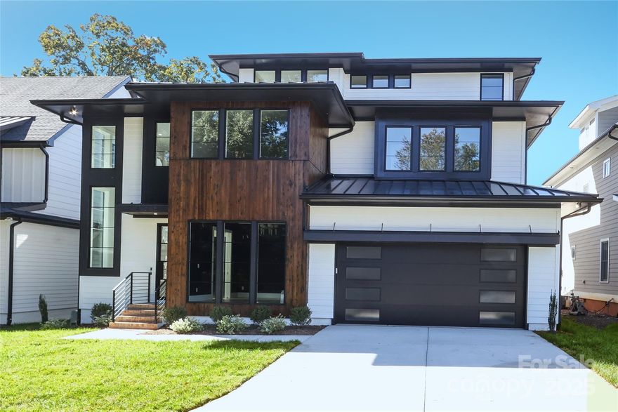 Newer construction in the hear of Dilworth/Southend! This custom homes with modern details was built by renowned local builder Jas-am. 5 bed 5.5 bath Lg. guest room or second primary on main as well as primary suite on second floor will fit the needs of todays buyer. The open kitchen features Wolf/Subzero appliances, waterfall countertops, and custom tile backsplash. Second floor features laundry, three add. beds and spacious primary suite w/ zero entry shower. Third floor bonus room and full bath with city view of uptown Charlotte. Stained Cypress wood on exterior, dramatic modern lighting, outdoor space w/ screened porch, landscaped yard w/ irrigation, so much more! Quiet street in the heart of it all!