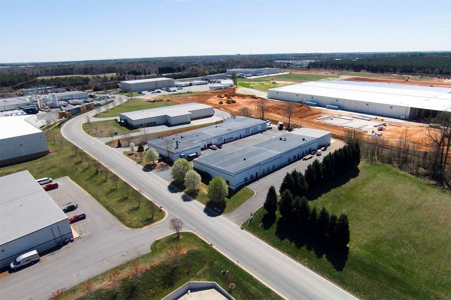 Looking for a Great Income Producing Opportunity? Zoned G-I, Located in Sierra Race Park, Perfect Location Just off Mazeppa Road. Multi-Purpose Industrial Use, Automotive, Race Teams, Warehouse, General Contractors, Vendors. Building 1 Has 5 Units (A-E)  Building 2 Has 5 Units (F-J). All Units Have 200 AMP 3 Phase Power, Gas Unit Heaters in Shop Areas, Large Office Areas w/AC, Community Loading Dock.  All units have at least 1 Bathroom, some have more. Each unit has been up-fitted for either warehouse or office spaces. Units can be combined to cr Additionally 1 Garage and 2 Storage Areas. .eate a bigger space in future. Existing Tenants in Place!