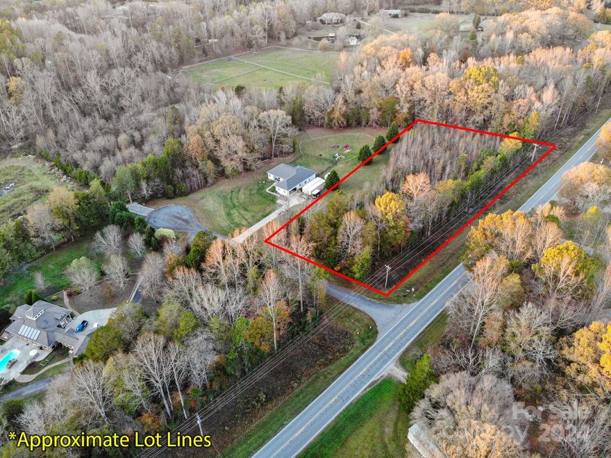 Prime 2.19-acre wooded lot is located on Highway 73, perfectly situated between Lincolnton and Denver, with less than a 15-minute drive to each. Enjoy the best of both worlds, the charm of small-town living and proximity to city conveniences. This location offers easy access to Charlotte Douglas International Airport in 30 minutes and downtown Charlotte in 40 minutes. Ideal for building your dream home that feels like a retreat, the property’s natural setting provides privacy while maintaining excellent connectivity. Don’t miss this rare opportunity to own a centrally located piece of land with endless potential!