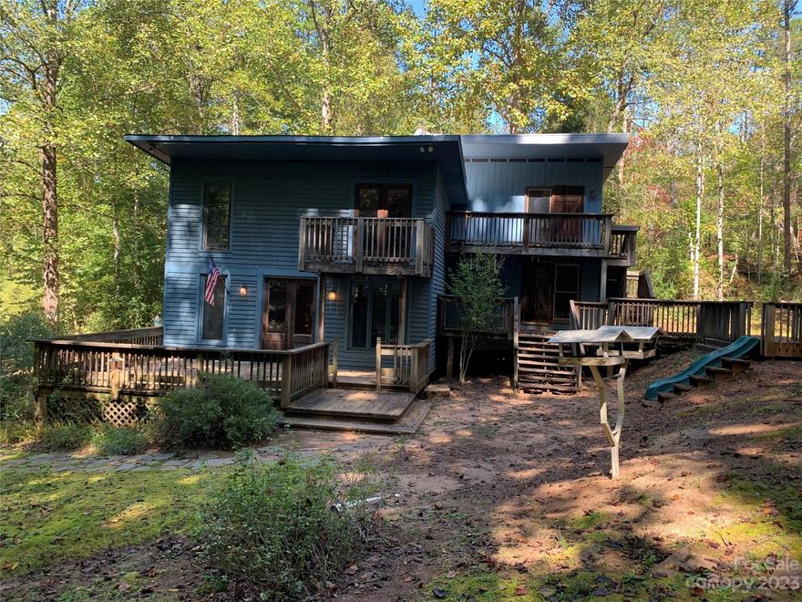 Unique opportunity. Beautiful property with two homes. Approximately 32.5 acres with a nice creek, grassy areas for possible pasture and lots of wooded areas to enjoy the wildlife or ride your ATVs. The cabin on the property was built in 2010, has approx. 536 SF with one bedroom & one bath & the other home has 3 levels with approx. 1400 SF, 3 BRs, 2 BAs & numerous decks to enjoy the outdoors.  Lots of creek frontage so a portion of the property is in a flood zone. The two homes share a well.  Seller says No Restrictions! This property is located off Centennial Rd. and is very convenient to Hwy. 64.