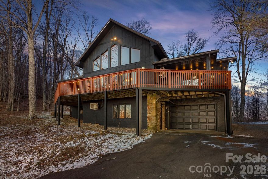 Nestled in the stunning Wolf Laurel Resort & Country Club, this charming home is perfectly situated just under 2 miles from the breathtaking Hatley Pointe Ski Resort lodge, offering unparalleled convenience for your mountain home and offering access to a range of exceptional amenities!
The front of the house has long range mountain views and the slopes of Hatley Pointe, and the back borders 935 acres of conserved land owned by the Town of Marshal. This offers an unmatched combination of convenience, beauty and permanent privacy.
This home has hundreds of thousands of dollars worth of recent updates and it's truly a show stopper, set up to be a one of a kind Luxury Vacation Rental or the ultimate dream home for you, your family and guests! 
Besides the main 3000+ SF home, there is a charming separate apartment with a lower level play room set up for great entertainment.
With a total combined livign area of over 4,175 SF, 5 bedrooms (plus a bunk room!), 4 bathrooms, 2 kitchens and 2 houses, it comfortably accommodates large groups. Enjoy pickleball, tennis, and basketball courts, two playgrounds, on-site fishing, a community pool, and a newly renovated ski and snowboard resort Hatley Pointe. Golf enthusiasts can take advantage of discounted packages for an additional fee. Plus, the home is just half a mile from a trailhead leading to the iconic Appalachian Trail, making it the perfect spot for hiking lovers.

This home offers the perfect blend of luxury, nature, and convenience. 
Live in, Vacation here or continue using the home as a successful short-term rentalsince all furnishings are negotiable! (this home was planned, designed turn key step by step by the reknown BNB Academy Program, making it an excellent and proven income-producing opportunity with amazing starting numbers and remarkable projections!!) **

Unmatched opportunity! Sellers motivated!!!