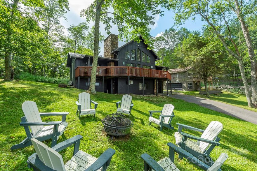 Nestled in the stunning Wolf Laurel Resort & Country Club, this charming home is perfectly situated just under 2 miles from the breathtaking Hatley Pointe Ski Resort lodge, offering unparalleled convenience for your mountain home and offering access to a range of exceptional amenities!
The front of the house has long range mountain views and the slopes of Hatley Pointe, and the back borders 935 acres of conserved land owned by the Town of Marshal. This offers an unmatched combination of convenience, beauty and permanent privacy.
This home has hundreds of thousands of dollars worth of recent updates and it's truly a show stopper, set up to be a one of a kind Luxury Vacation Rental or the ultimate dream home! Besides the home, there is a charming separate apartment with a lower level play room set up for great entertainment.
With a total combined livign area of over 4,100 SF, 5 bedrooms (plus a bunk room!), 4 bathrooms, 2 kitchens and 2 houses, it comfortably accommodates large groups. Enjoy pickleball, tennis, and basketball courts, two playgrounds, on-site fishing, a community pool, and a newly renovated ski and snowboard resort Hatley Pointe. Golf enthusiasts can take advantage of discounted packages for an additional fee. Plus, the home is just half a mile from a trailhead leading to the iconic Appalachian Trail, making it the perfect spot for hiking lovers.

This home offers the perfect blend of luxury, nature, and convenience. This successful short-term rental was planned, designed turn key step by step by the reknown BNB Academy Program, making it an excellent and proven income-producing opportunity with amazing starting numbers and remarkable projections!

Unmatched opportunity! Sellers motivated!!! Buyers Incentives if closed by March 15!!!