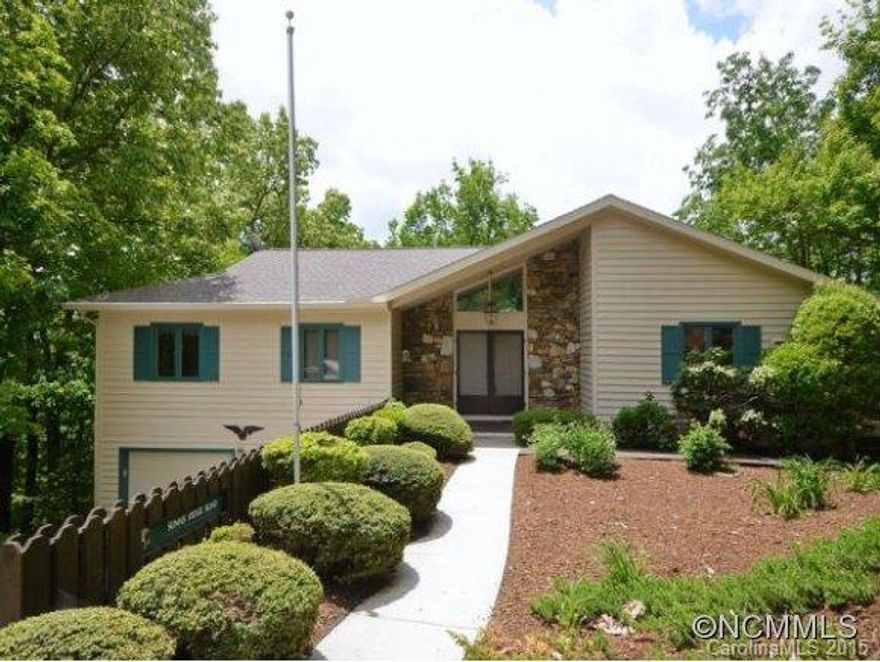 South Westerly Mountain Views, floor to ceiling stone fireplace, KitchenAide Stainless Steel Appliances & solid surface countertops in the cook's kitchen, hardwood floors, new tile shower in master bath...all the things your buyers are looking for today & in much demand in popular Laurel Park. Great outdoor living areas, quiet & secluded, yet in the town of Laurel Park with all of its amenities. Come see! You'll be glad you did!