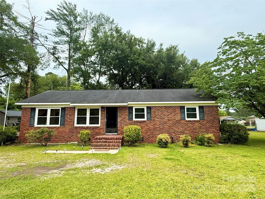 Major $20k Price Improvement. . All-brick 4BR/1BA home in charming Cheraw, SC! With 1,200 sq ft of living space plus a versatile flex room—perfect as an office, den, or 4th bedroom—this home offers flexibility to fit your lifestyle. Newer vinyl windows provide energy efficiency and natural light. Conveniently located near shopping, dining, and downtown amenities. Ideal for first-time buyers or investors seeking rental potential. Enjoy the small-town charm of Cheraw with its historic downtown, welcoming community, and easy access to outdoor recreation. A great opportunity to own in one of South Carolina’s most beloved towns!