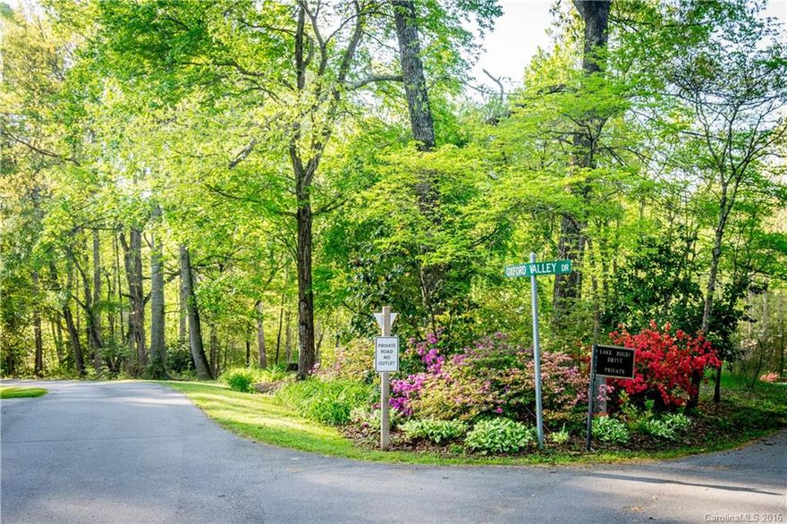 Easy Build lot, nice and level. Surrounded in lovely setting in Lake Rugby Community. Close to town, with easy access to West Asheville and Brevard. Build your dream home in a tranquil lake environment.