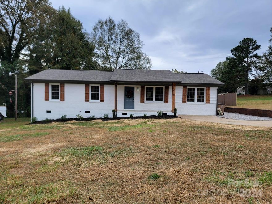 Check out this stunning move-in ready 4-bedroom, 2-bathroom home! Enjoy cozy nights by the fireplace and host gatherings on the back deck. The backyard is perfect for bonfires around the firepit. You don't want to miss this opportunity!