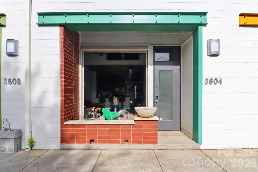 Unique loft-style condo located in the heart of NoDa’s arts district, just a short distance to restaurants, breweries, and the light rail. Situated in a historic mill conversion, this 2-story industrial condo features exposed beams, concrete and hardwood floors, and an open, airy layout filled with character. The standout feature is the oversized garage-style door that opens to extend the living space —perfect for enjoying during ideal weather. Don't miss the screen as an option for when you do not want complete open air. . Community amenities include a shared firepit and grill area for relaxing or entertaining. New HVAC in 2021 adds peace of mind. A rare opportunity to own a true industrial-style space in one of Charlotte’s most vibrant neighborhoods.