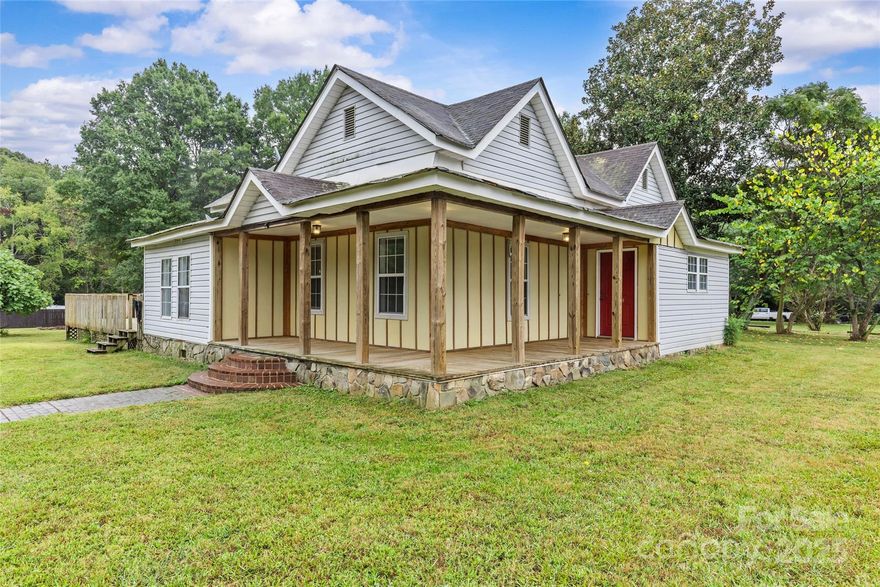 Discover the charm and privacy of this farmhouse cottage nestled on a sprawling 0.8-acre lot in highly desirable Matthews! This 2-bedroom, 2-bath home offers 1,508 sq ft of character-rich living space with NO HOA. Enjoy a spacious kitchen with stainless steel appliances, modern flooring, and a beautiful tray ceiling in the second bedroom. Relax on the inviting front porch or entertain on the generous rear deck. The large, partially fenced lot provides ample room for pets, play, or future additions. Ideally located close to shopping, dining, and good schools, this is your rare opportunity to enjoy land and freedom just minutes from it all!