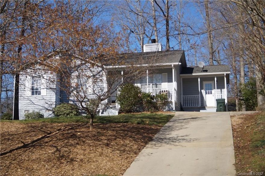 Cute little ranch starter home. Wooded lot. Creek along side of property.  Front and side porch. Large Deck, nice big outside storage. NO HOA'S, fireplace, ceiling fans. Laundry off kitchen. Central Air new in 2016. Immediate possession. Great Rock Hill Location. 12x14 outbuilding w/power. New roof, 2009 w/architectural 30 yr shingles.  Additional storage under house.