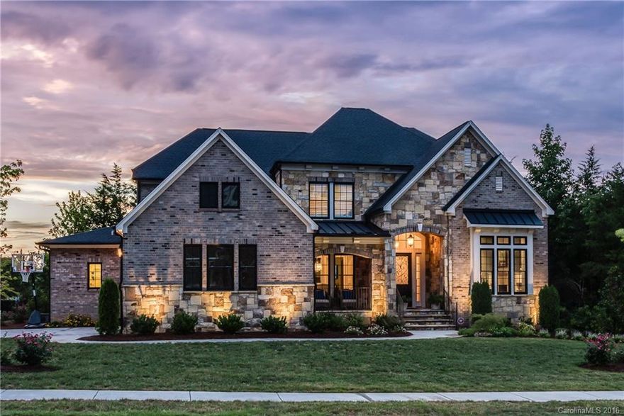MOVE in Ready Gorgeous luxury home in Longview LOADED w/upgrades! Beautiful open floor plan with Master on Main PLUS full guest suite! All hardwoods on main level,stairs & upstairs hallway. Amazing Gourmet kitchen with oversized island, large walk in pantry & Thermador gas cooktop. 2 bonus rooms on 2nd level including theater room! Big Walk-In Storage!  Spacious outdoor covered porch w/ gas fireplace;Fenced backyard!Enjoy the resort lifestyle that Longview has to offer! A+ Marvin Ridge schools!