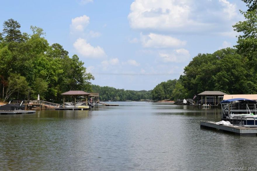 Build your home on this beautiful waterfront lot on Lake Wylie! Somerset at Autumn Cove, with a clubhouse and pool, excellent location near schools and shopping. This homesite looks straight out of the cove, a lovely view with a serene location.  Topography is perfect for building, level with easy access to the water.  Large 1.1 acre lot with 245' shoreline.  You'll love the cul-de-sac location.  Use your builder or one of ours.