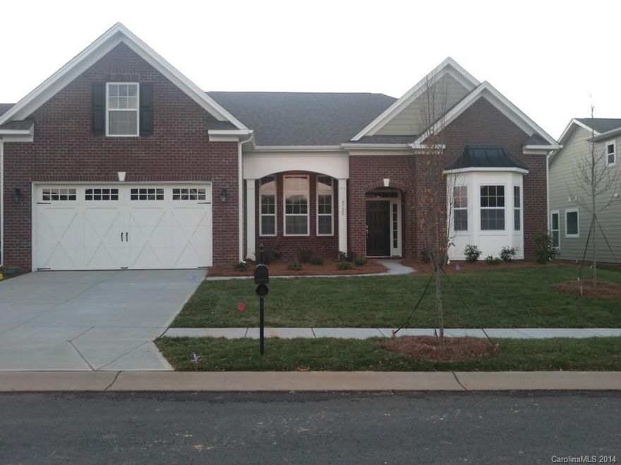 Outstanding ranch plan with extra bedroom/bonus upstairs.  Less than one block to waterfront trail and Lake Wylie!  Open plan with vaulted ceilings and great character features like built in bookshelves, granite in all baths, extensive mouldings. See Vineyards model home.