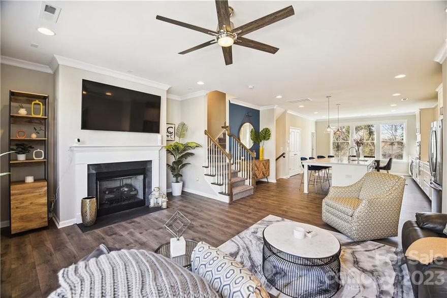 Come see this beautiful 3-story, end-unit townhouse, featuring a must see sky-terrace and located in the popular Cotswold neighborhood. Highlights include a bright and spacious gourmet kitchen on the main floor with upgraded cabinetry and a beautiful large center island. You’ll also find a spacious dining area with a wine & beverage center, and the living room features a gas fireplace and has sliding doors leading onto a rear deck. The lower level has a lovely and private guest bedroom with full bath, and is also where you’ll find the entrance and side-by-side 2-car garage. On the third level there are two owner’s suites, each with walk-in closets and double vanity bathrooms. The home is an end-unit on a corner lot, with lovely trees offering shade and privacy, and the sky-terrace is the perfect place for entertaining and enjoying the outdoor view. Wendwood Terrace also has a private dog park and its location in Cotswold puts it close to SouthPark, Uptown, Plaza Midwood and more.