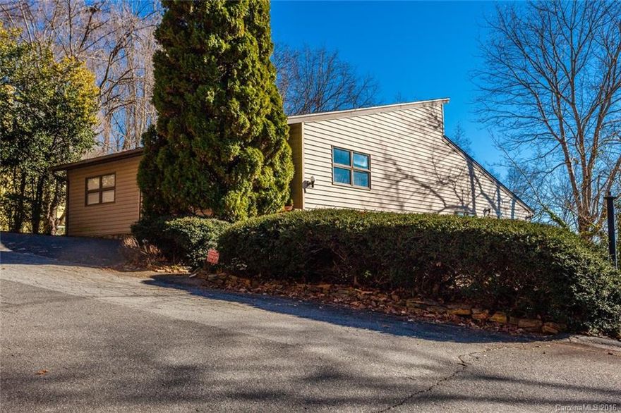 BREATHTAKING LAKE AND MOUNTAIN VIEWS.  Wrap Decks. Hardwood Floors.  3 STONE FPs: Kitchen/Breakfast Room, Great Room, Den/Bar. Vaulted Beamed Ceiling in Great Room. Sunroom with Built-in Grill. Home Office/Art Studio. Glass Wall in Great Room and Breakfast Room open to Views. Easy Access from off street parking area. Cherry Kitchen Cabinets. Party Room downstairs with Wet Bar, Game tables and room for Flat Screen. 2015 Property Taxes: $2777.05. 5 minutes from RBR Entry Gate. Private.