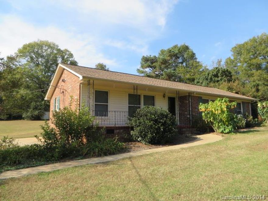 Quiet, relaxed, country-like setting! FULL BRICK RANCH situated on a pretty, .78 acre lot. Rocking chair front porch. Delightful screened porch overlooks the private, deep backyard. NEW Roof 2008. NEW Hybrid HVAC system. Gorgeous hickory HWs in LR/DR, refinished HWs in BRs. Updated eat-in Kitchen w/refinished cabinets, tile floor & ctrs. Roomy Master has 2 closets + remodeled bath. Guest bath w/tile floor. New lighting, ceiling fans. Workshop w/reinforced concrete,power,gas, loft & 2 entry ways.