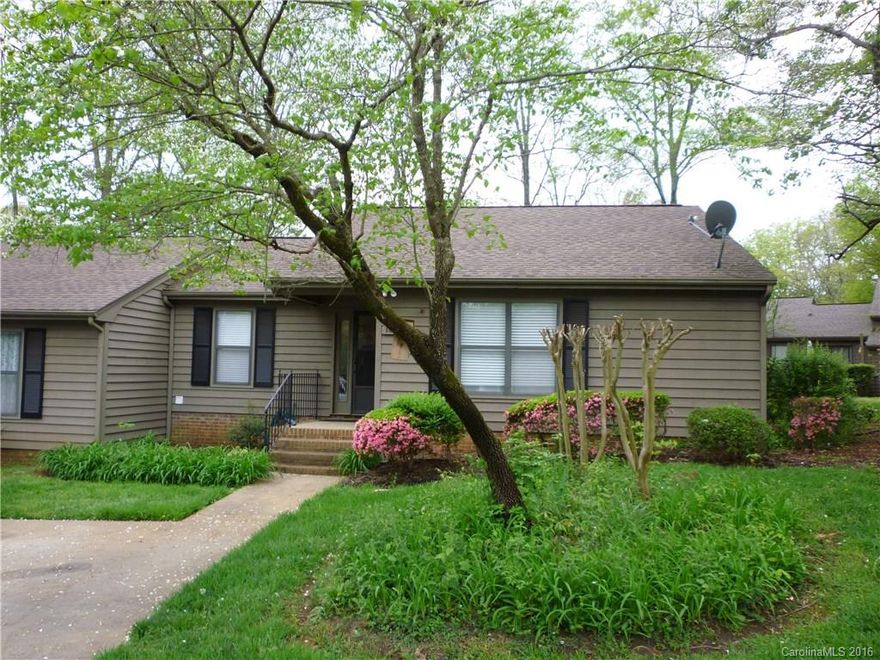 Beautiful end unit with completely remodeled kitchen.  Kitchen now opens to living room and offers new cabinets that go to the ceiling, new granite and new back splash.  New sliding doors were installed to the sunroom.  New HVAC was installed as well.  Newer carpet and paint was done recently too.  This unit is ready to move into.  Must see!