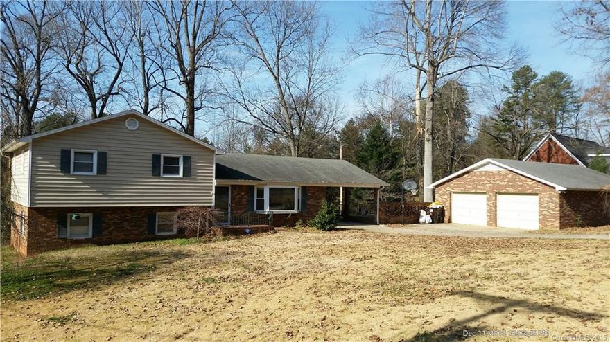 Great deal on a lot of square footage. Large deck for entertaining and detached 2 car garage is perfect for a workshop. Property sold As-Is, seller to do no repairs.