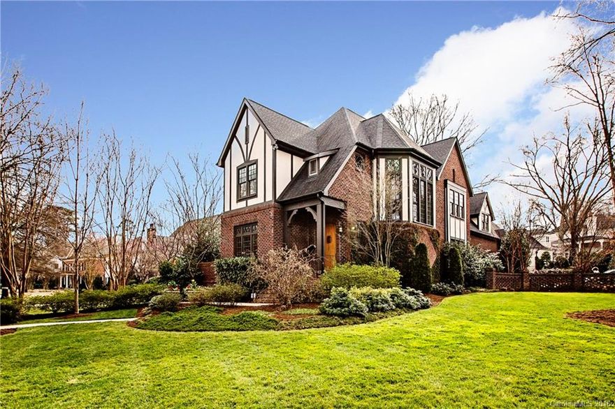 Elegant English Tudor home on beautifully landscaped lot. Formal foyer with grand staircase. Private owner's suite on main level with private terrace and adjacent private study.  Kitchen, great room and breakfast room flow openly into each other. Well appointed gourmet kitchen. Wet bar. Oversized garage.  Two laundry rooms-one on each level.  All secondary bedrooms have ensuite bathroom access and large closets.  Bonus room upstairs. Slate patio in rear with pergola. Wonderful natural light.