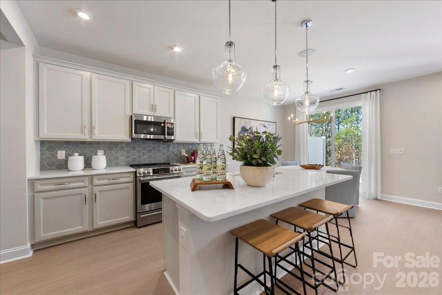 Bask in the best of Camryn at Southbridge at 201 Landy St, where scenic trails, a playground, and thoughtfully designed spaces blend comfort with style. This Falcon plan will feature a gourmet kitchen with direct vent, tray ceilings in the foyer and primary bedroom, oak box stairs with open rails, and a convenient drop zone by the garage, all crafted for effortless everyday living. An 8-foot wide, 8-foot tall sliding glass door will open to an extended 8x8 covered outdoor living area with serene, tree-lined views, while laundry access directly from the primary walk-in closet adds a thoughtful touch. Situated near the community's walking trail entry with no neighbors in front or behind, this home offers rare privacy in a connected setting. Just minutes from Kingsley Town Center, Anne Springs Close Greenway, and top-rated schools, every convenience will feel within reach. Designability is at the heart of the experience, giving you the opportunity to personalize finishes alongside an expert design team in our award-winning design studio while tracking your home’s progress through a one-of-a-kind app. Photos are representative of the Falcon floor plan