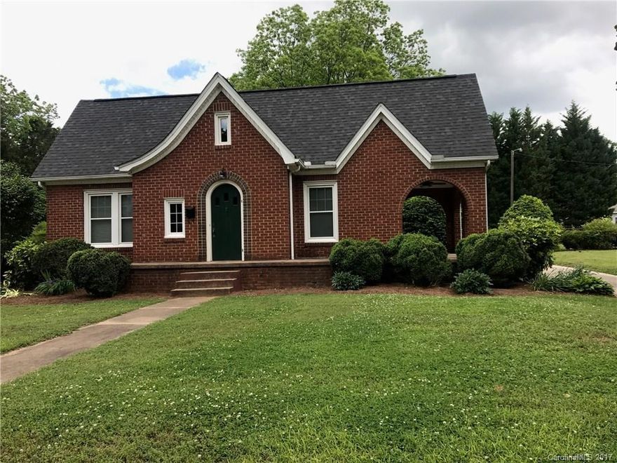 Charming all brick with character plus! Gleaming original wood floors and original antique glass door knobs with beautiful arches!  2 car garage with attached storage/workshop, partially fenced back yard - Fireplace in master bedroom and living room great renovations and wonderful space- this one will not last long!!
enter side door
