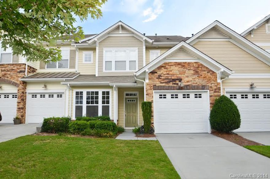 Fabulous well maintained town home with upgrades that include granite counter tops w/tile back splash, stainless appliances, double oven, Teak wood hardwood floors, upgraded appliances, lighting and plumbing. Master down and another master on second level.   Walk in closets in all bedrooms!  This home is unique to this neighborhood!  Too many features to mention, must see to appreciate today-this one will not last!