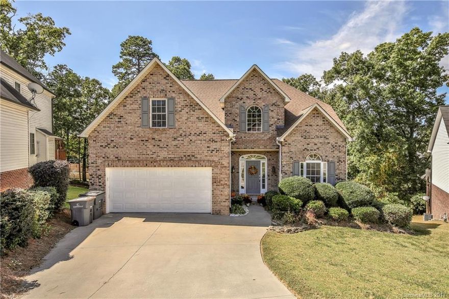 Beautiful home on large fenced lot on a quiet cul-de-sac. Open floor plan of this 4 bedroom/2.5 bath home features an updated kitchen with granite counters that opens to 2-story great room with fireplace. Master suite on the main floor features a walk in closet, garden tub and sep. shower.  Upstairs boasts 3 bedrooms and a full bath, along with catwalk and loft area.  Attached 2 car garage. Nice deck overlooks private, wooded backyard. New roof 2015. Small community with NO HOA fees!