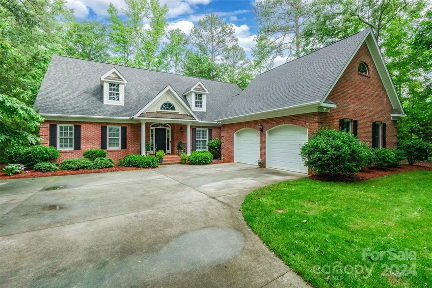 Indulge in the serenity of this cherished one-owner 3 bedroom, 2.5 bath haven, nestled on a private, natural lot. Adorned with plantation shutters in the dining room & bedrooms, crown molding, and true hardwood floors, every detail exudes warmth and elegance. Bask in the glow of a gas log fireplace in the great room, surrounded by transom windows flooding the space with natural light. Tiled baths and his/her closets in the primary suite offer luxury and convenience. Enjoy the tranquility of pond-fed irrigation and shoreline access, maintained by the HOA. Recent updates include a new roof in 2024, updated plumbing in 2024 and a new HVAC system in 2019, ensuring your piece of mind. Expand your living space with attic potential above both the home and garage. This Southern Living floor plan gem offers endless possibilities. The community offers a clubhouse, pool, ponds, tennis courts, and fishing amenities. Welcome home to timeless beauty and modern comfort.
