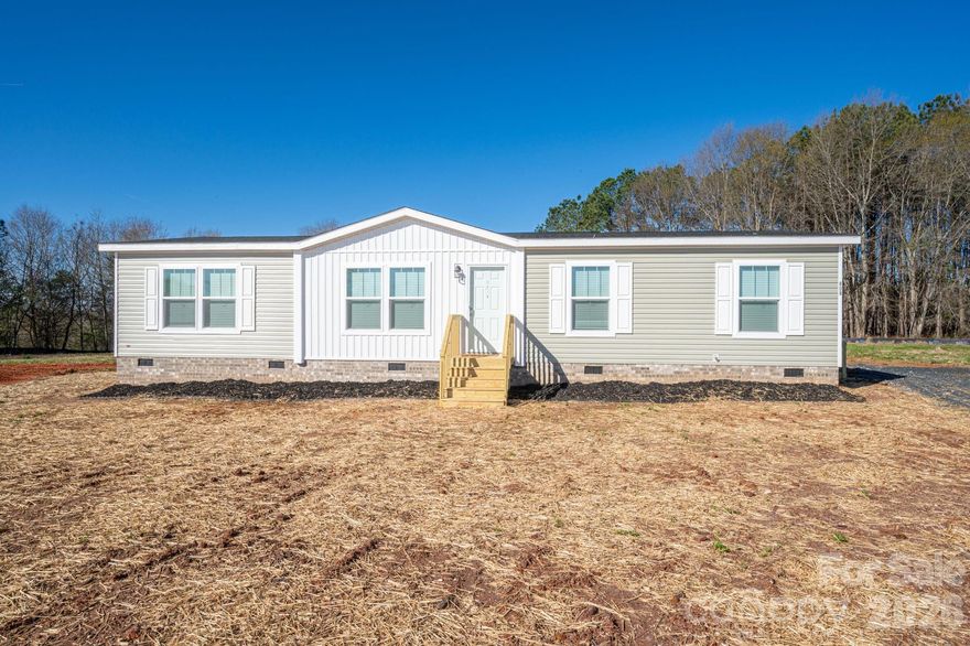 *BACK ON MARKET AT NO FAULT OF THE SELLER* This stunning 3 bedroom, 2 bathroom residence spans 1,488 square feet on a .66 acre lot in the desirable and recently developed Eagleview subdivision. The kitchen boasts a spacious island and stainless steel farmhouse sink, complemented by matching appliances. An elegant archway entrance from the kitchen leads to the living room, which features a recessed wall-mount electric fireplace. The primary bathroom is a serene retreat with a tile walk-in shower, expansive double vanity, and a substantial free standing bathtub. The laundry room offers ample cabinet and counter space, along with a utility sink for added convenience. Schedule your showing TODAY!