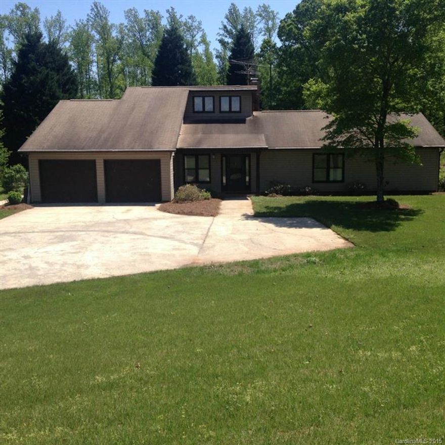 Country living at its best spacious home two-car garage attached, fireplace with wood stove three-bedroom 2 1/2 bath vaulted ceiling unique glassed in porches with passive solar heat,Only a short drive to Rock Hill,Great for animals, livestock, gardening, hunting