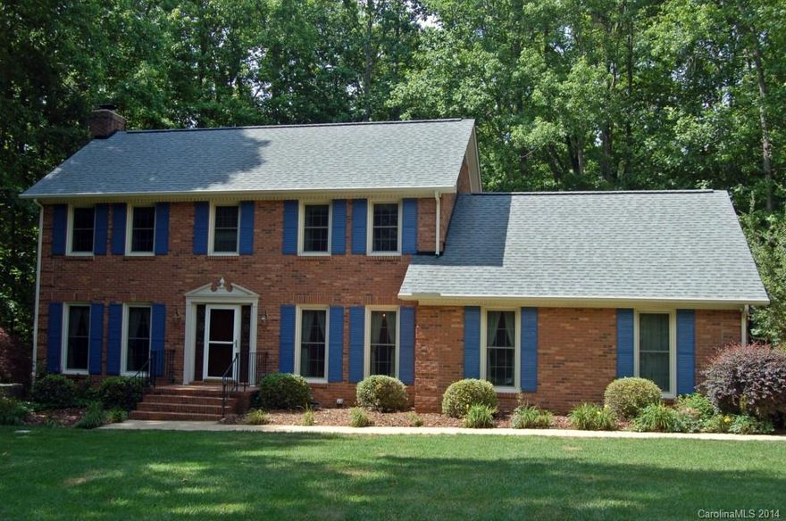 Wonderful brick 2 story home, huge great room with fireplace, kitchen with spacious breakfast area, formal dining room, sunroom with cathedral ceiling. Master Bedroom & 2 additional bedrooms upstairs. Separate bonus room over garage with private stairs off mudroom. Beautiful wooded & landscaped 1 acre lot. Great schools, great location!