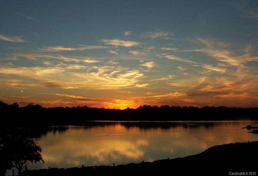 Seller wants to sell! Bring offers! Lake Norman waterfront condo on Davidson Landing. Three Bedrooms, second floor unit, new carpet, new paint. Ready for you to move into! Community offers leased Boat Slips, Pool, Tennis Courts and Walking Trails. Lake Boardwalk with gazebos to watch the sunset!