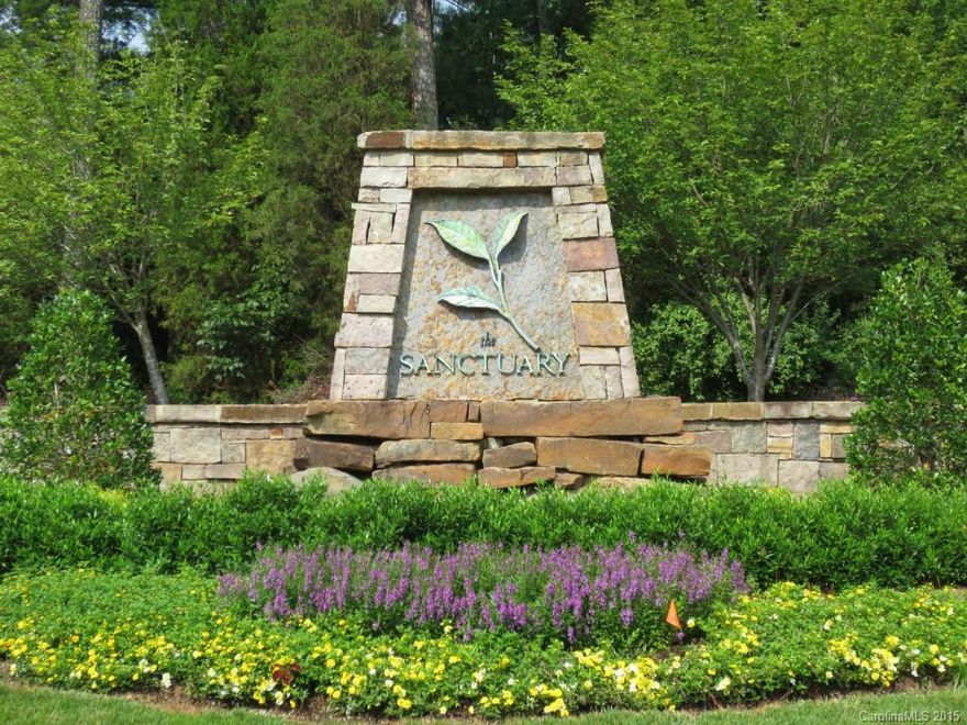 7ac Wooded Estate Home site in one of the most exclusive luxury lake communities in the SE. Perfect opportunity to build your private dream home. 7mi of shoreline, 20mi of nature trails, 1350ac nature reserve, 300ac common space & 17ac of wtrfront amenities w/swimming pool, tennis courts, fitness, playground, amphitheater & so much more. 20 mins from CLT Douglas Airport & Uptown CLT. AC Lynn Homes can custom design & build your dream home, if interested.