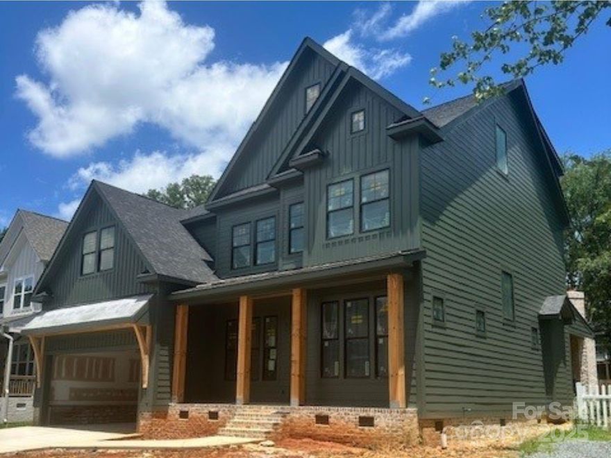 Welcome to this stunning new construction home in the desirable Sedgefield neighborhood. This property features a private office with French doors, a formal dining room, and a butler's pantry with a beverage cooler. The impressive kitchen includes a large island and a walk-in pantry with custom shelving. Appliances include a 64" Frigidaire refrigerator/freezer, a 48" KitchenAid pro dual fuel range, a KitchenAid dishwasher, and a microwave. The breakfast nook boasts a vaulted wood ceiling and large windows for plenty of natural light. The family room features wood beams, built-ins, and a gas fireplace. Sliding glass doors lead to a screened porch with a wood-burning fireplace and a fenced backyard with full irrigation. Upstairs, the spacious primary bedroom offers a walk-in closet with built-in cabinetry, along with three additional bedrooms and two full bathrooms. The third floor includes a large bonus room, a full bath, and a fifth bedroom.