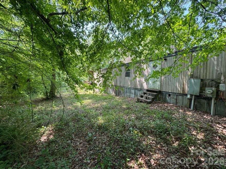 Investor special with tons of potential! Situated on approximately 1.98 acres across 3 parcels, this unique property offers space, privacy, and opportunity. The existing 3-bedroom, 2-bath home features approximately 980 square feet and is ready for your vision and updates. Home needs TLC and is being sold as-is, making it a great fit for investors, flippers, or buyers looking to renovate and create value. With up to 2 acres to work with, there’s room to explore future possibilities, expansion, or simply enjoy the extra land.