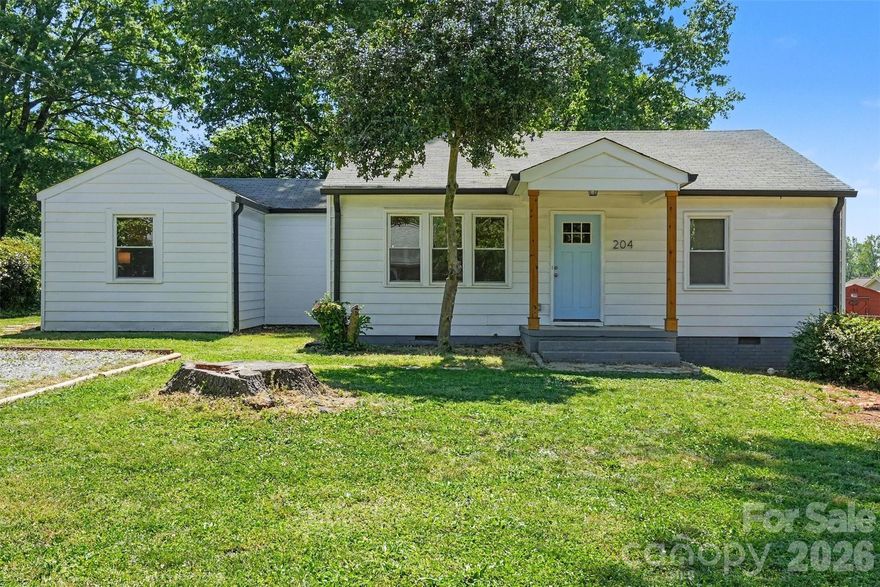 This remodeled bungalow is full of charm and located just minutes from downtown Lowell!  Situated on a spacious lot with fencing on three sides, this property offers both privacy and plenty of outdoor space to enjoy.  

Inside you will find three bedroom and two full bathrooms with an oversized third bedroom that provides a flex space for a home office, playroom or additional living area.  The home has been thoughtfully updated  within the past three years, including new windows, doors, fixtures, HVAC, electrical, water heater and under home plumbing - offering peace of mind for years to come.  

The beautifully renovated kitchen featuring a large quartz island, quartz countertops, a Maytag cooktop and a farmhouse sink - perfect for both everyday living and entertaining.  Tile flooring and refinished hardwood floors run throughout the home, adding warmth and style to this move-in ready home.  Don't miss out on this gem.

Super easy access to I-85.