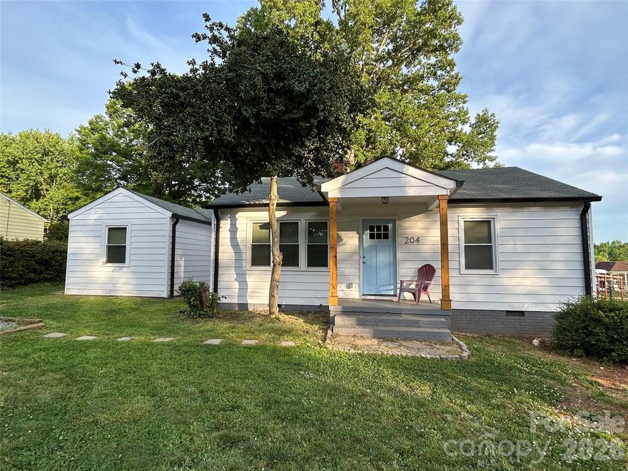 This remodeled bungalow is full of charm and located just minutes from downtown Lowell!  Situated on a spacious lot with fencing on three sides, this property offers both privacy and plenty of outdoor space to enjoy.  

Inside you will find three bedroom and two full bathrooms with an oversized third bedroom that provides a flex space for a home office, playroom or additional living area.  The home has been thoughtfully updated  within the past three years, including new windows, doors, fixtures, HVAC, electrical, water heater and under home plumbing - offering peace of mind for years to come.  

The beautifully renovated kitchen featuring a large quartz island, quartz countertops, a Maytag cooktop and a farmhouse sink - perfect for both everyday living and entertaining.  Tile flooring and refinished hardwood floors run throughout the home, adding warmth and style to this move-in ready home.  Don't miss out on this gem.

Super easy access to I-85.