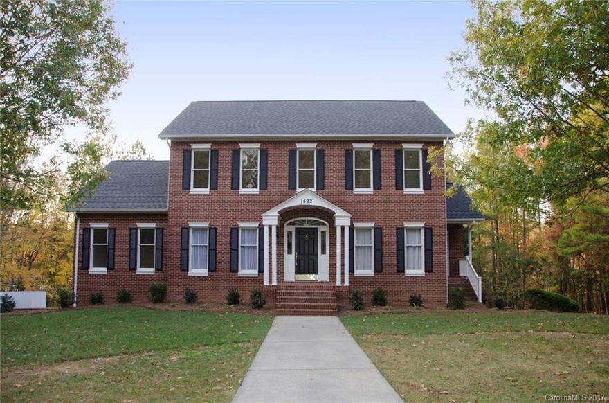 Completely remodeled 5BR, 3 full 2 half BA home. Sunroom and huge entertainment room with wet bar. New bamboo wood flooring, carpet, and tile throughout. Granite countertops and other upgrades. New roof in 2016 and 2 new HVAC units. New hot water heater. Located in beautiful, shady forest hills!