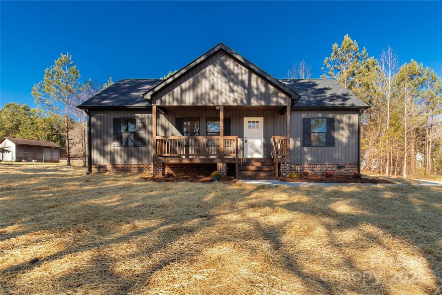 Stunning new build on 1.36 acres. This gorgeous home will surely catch your attention with its trendy dark exterior. Continue to be impressed as you walk up and notice the stained porches, with wood tongue & groove ceilings. Inside you'll find upgraded quartz countertops, luxury vinyl plank flooring throughout, oil-rubbed bronze fixtures, and an on-trend color palette making decorating a dream! The split floorplan of this home allows for extra privacy as the primary bedroom features an en-suite bath and walk-in closet. The 2 guest rooms are on the opposite side of the home and share a full bath. This one ticks all the boxes and will be ready in time for the Holidays!