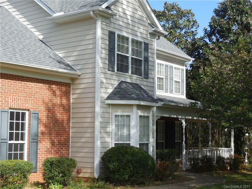 Beautiful 4 B/R & 3 Bath home in desirable location! Weddington Schools & NO HOA! Over an acre with add. separate 1-car wired garage (16x21) with workshop. Walking to Dogwood Park with Trails and Picnic areas.  Fresh decorator paint throughout main floor. Mainly laminate wood throughout except new carpet on stairway & tile in kitchen & min. vinyl. New disposal in kitchen along w/ Stainless Steel stove and microwave. Covered front and side porch enhances this beautiful home. Target&Shopping Ctr.