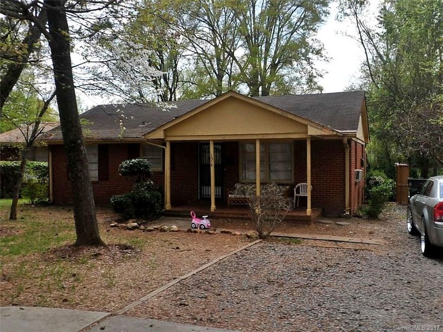 Completely renovated from studs up! Open concept floor plan makes this home feels even larger than it is. Living room is open to kitchen; boasting 42" cabinets, granite countertops, tile backsplash. Dedicated master suite has its own walk in closet & master bath. Fenced in yard, tankless water heater, tile & hardwoods throughout. Oversized laundry/mud room/drop zone. Covered(!) back porch can easily be screened/converted to a 4 season room down the road by buyer. Close to NoDa, Plaza Midwood etc