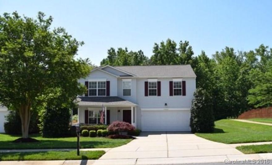 Fall in love w/ this fabulous 2 story home in Hamilton Green located South Charlotte!  Enjoy your coffee from the porch swing overlooking a beautifully landscaped yard.  This home features tons of living space, four BR w/ spacious walkin closets, 2.5 BA, formal LR w/ custom built-in shelving.  Huge GR & kitchen w/stainless appls and dining area w/ a nice view backyard.  Gorgeous flooring throughout! Community offers sidewalk lined streets, pool & playground! Convenient access to I-77 and Hwy 49!