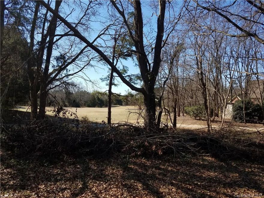 You can now own this beautiful view of the 9th hole and pond of Firethorne Golf Course! (some million $ homes!) This 2-acre parcel is level, with some trees, but mostly cleared. There is a house on the property that is in disrepair (could be used for storage), but it is a good place for a home site. Well & septic. Private road (Wade Carnes) -292 feet of road frontage, but this property is accessed from Ralph Hood Rd (see sign at mailbox). No HOA. Seller & agent are unaware of any restrictions.