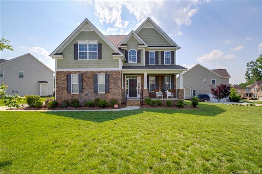 Amazing move-in ready home! Open floor plan w/tons of natural lighting. Gourmet Kitchen w/42" cabinets, granite & s.s. appliances! Hardwoods on main level, 9' ceilings & upgraded w/crown, chair rail & picture frame moldings. Luxurious owners suite with tray & vaulted ceilings, garden tub, walk-in shower, dual vanity & walk-in closet. Huge Bonus Room/Bedroom 5. Relaxing sun room w/vaulted ceiling overlooking spacious deck & large back yard. Minutes from Ballantyne, Blakeney, Fort Mill & I-485!