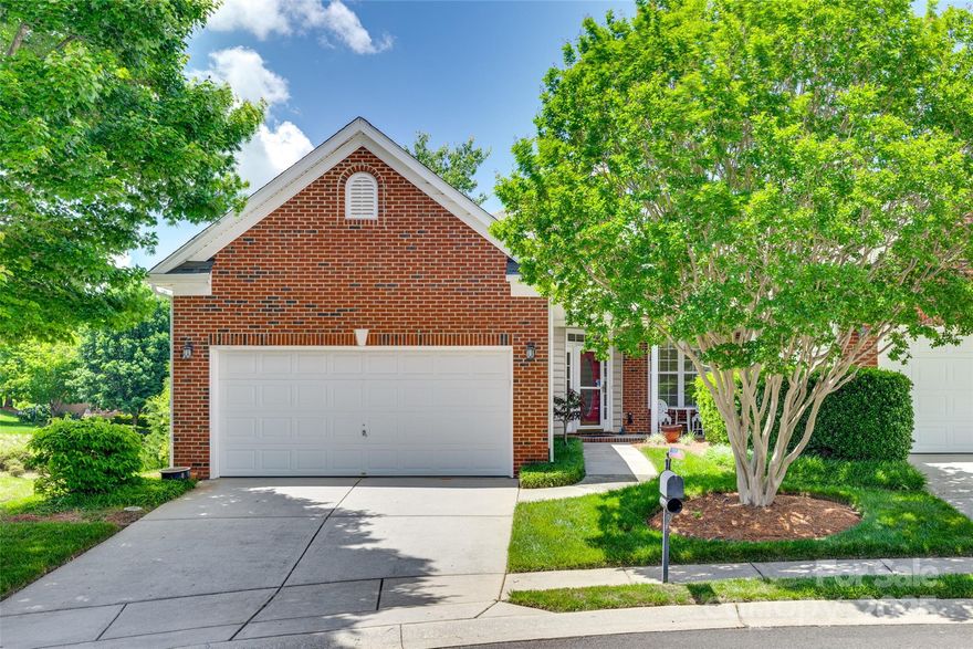 DON’T MISS this charming end-unit one-story townhouse in the 55+ community of Four Seasons at Gold Hill in Fort Mill. Enjoy low maintenance, easy living in an open-concept home with 2 beds, 2 full baths, great room with a cathedral ceiling, gas fireplace, formal dining room w/bay window, living room & laundry room. Windows galore for great natural light. The primary bedroom features a cathedral ceiling, 2 walk-in closets, ensuite with tub/shower, & dual sinks. The spacious eat-in kitchen has a bay window & breakfast bar. Relax on the covered front porch or on your private, no-maintenance composite deck with pond views. Includes a 2-car garage & washer/dryer and refrigerator. There is something for everyone in this beautiful community. It is a short walk to shops, the clubhouse, & amenities, including tennis, a fitness center, sports courts, & a pool. Discover the perfect blend of comfort & convenience at Four Seasons at Gold Hill, where luxury meets easy living. Your dream home awaits.