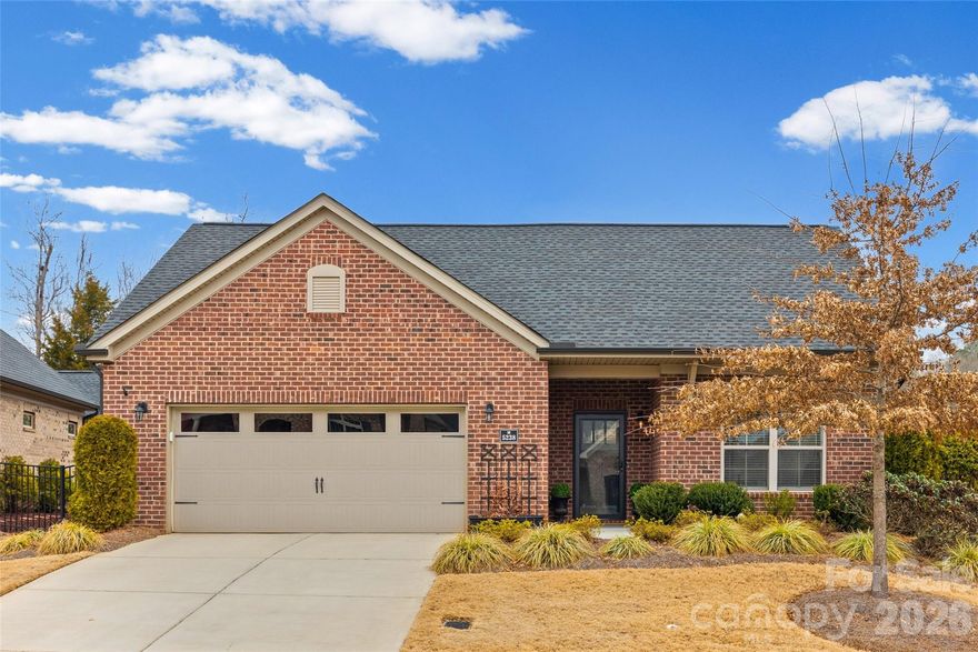 Low maintenance meets luxury in the desirable 55+ community of The Courtyards at Cramerton—just minutes from the quaint downtown areas of both Belmont and Cramerton.

This stunning full-brick, single-family home offers true one-level living with exceptional design and thoughtful upgrades throughout. A color-drenched foyer welcomes you inside, complemented by designer lighting, gorgeous hardwood floors, and soaring 9+ foot ceilings throughout. The open-concept layout is ideal for both everyday living and entertaining, featuring a generous living area with a gas log fireplace focal point, a spacious dining area, and a gourmet kitchen—all enhanced by a striking trey ceiling.

The chef’s kitchen is a showstopper, complete with a gas cooktop, decorative vent hood, wall oven and microwave, ebony cabinetry, quartz countertops, a stunning tile backsplash, under-cabinet lighting, and an incredible walk-in pantry with custom shelving. Just off the main living space, step out to your private courtyard patio—fully fenced for both relaxation and privacy—creating the perfect indoor-outdoor entertaining flow.

The primary suite is a true retreat with a trey ceiling, spacious walk-in closet, and a separate sitting area overlooking—and offering direct access to—the courtyard. The spa-inspired primary bath features a zero-entry tile shower, dual sink vanity, and private water closet.

Two secondary bedrooms provide flexibility for guests or a home office, accompanied by a beautifully appointed guest bath with tiled shower. A spacious laundry room offers room for a home command center, while a mudroom, generous walk-in storage closet, and multiple linen closets ensure exceptional organization.

Complete with a two-car garage, fenced backyard, and an unbeatable layout, this home delivers upscale, low-maintenance living in one of the area’s most coveted active adult communities.