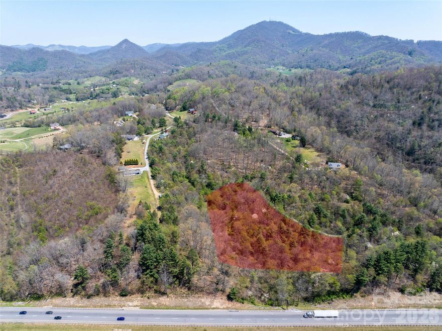 Discover the perfect mountain retreat with this beautiful 2.68-acre home site located in the desirable Hyder Mountain Acres subdivision, nestled in the heart of Haywood County and the scenic Blue Ridge Mountains. With selective trimming, the property boasts stunning panoramic views—ideal for enjoying the peaceful mountain setting. Conveniently located near I-40, this lot provides quick access to Asheville, Tennessee, and all that Haywood County has to offer. The subdivision requires only a 1,000-sqft min build, offering great flexibility for your home design, manufactured not allowed.
