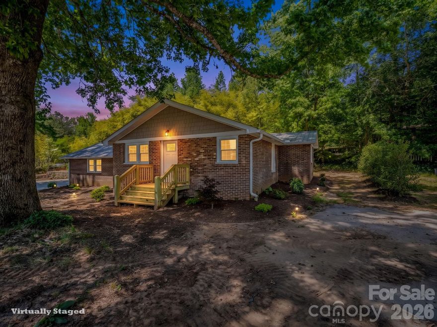 Solid brick. Total transformation. Unbeatable location. This move-in ready 3BR/2BA ranch off Hwy 14 has been fully reimagined from top to bottom. New kitchen, updated bathrooms, refinished hardwoods, fresh paint, new metal roof, new HVAC, and new insulated windows. But the owners went further than most: blown insulation and thick-gauge drywall create a whisper-quiet, energy-efficient interior that feels as solid as it looks. The stunning open-concept floor plan lets it all shine. Every major system has been upgraded for years of maintenance-free living, making this one of the most turnkey values in the area. Minutes to downtown Landrum's shops, dining, and community charm. Whether you're downsizing or buying your first home, this rare combination of high-end performance and classic brick construction is ready and waiting. Don't miss it!
