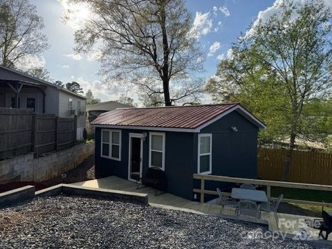 Photo of 113 Hideaway Trail, Mount Gilead, NC 27306 (MLS # 4243640)